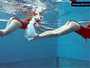 2 steaming teens underwater