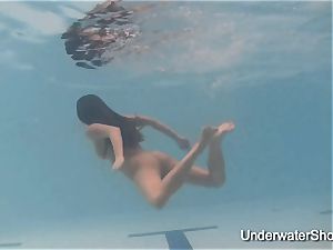 softcore underwater display of Natalia